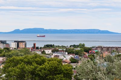 View of downtown Thunber Bay Ontario, Canada north ward and harbour from Hillcrest Park, with Sleeping Giant in background